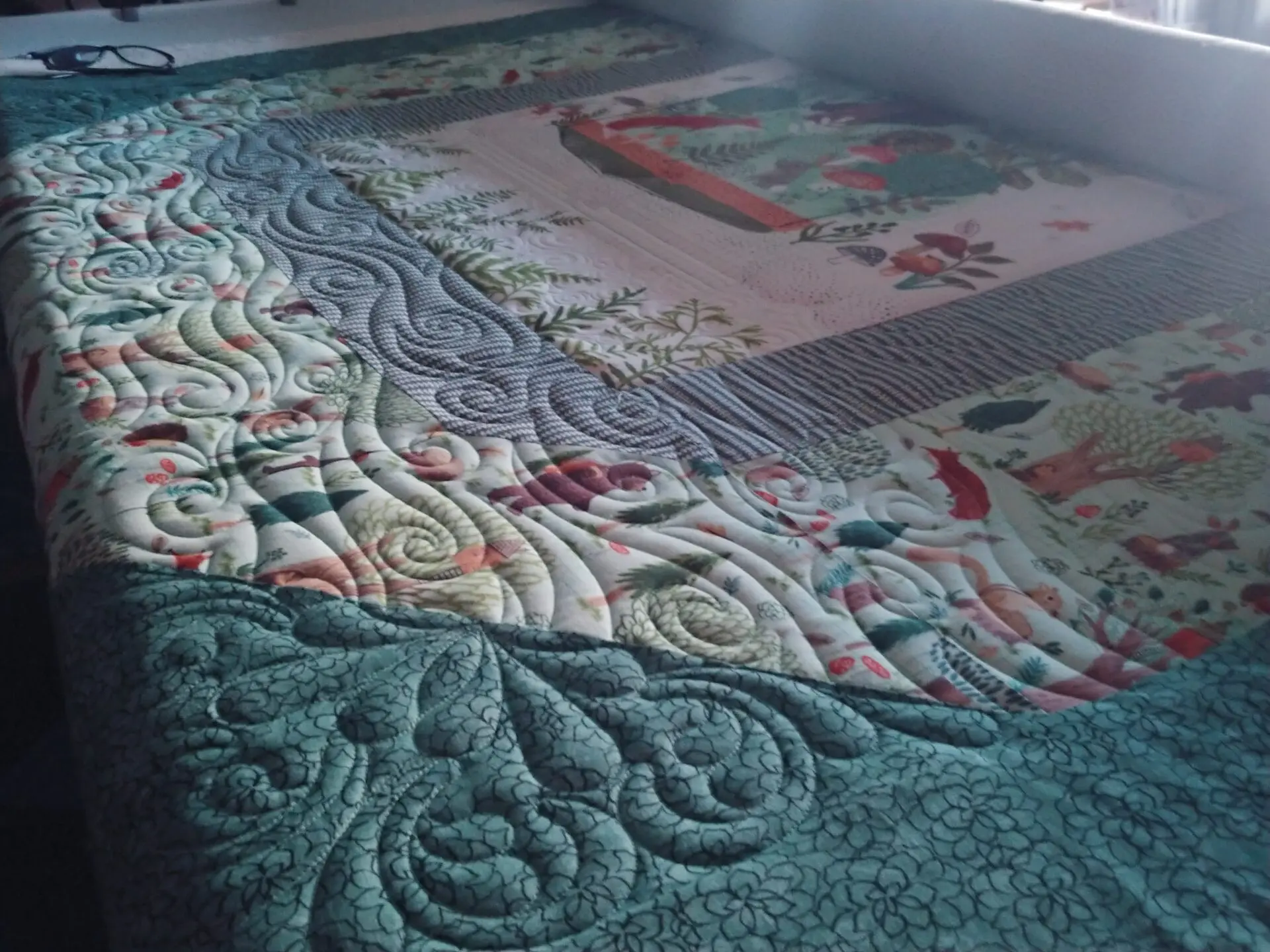 A close up of the quilt on the floor