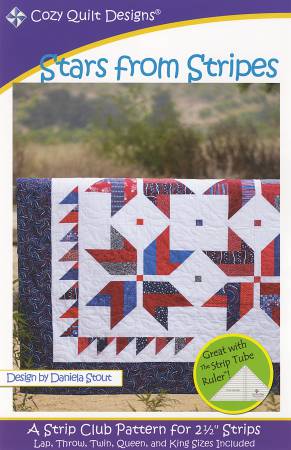 A quilt that is made of red, white and blue fabrics.