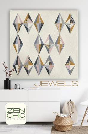 A white wall with a painting of diamonds on it.