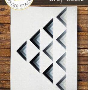 A white paper with black and grey triangles on it