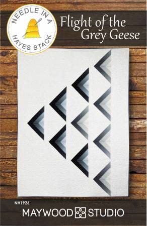 A white paper with black and grey triangles on it