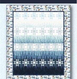 A quilt with blue and white designs on it.