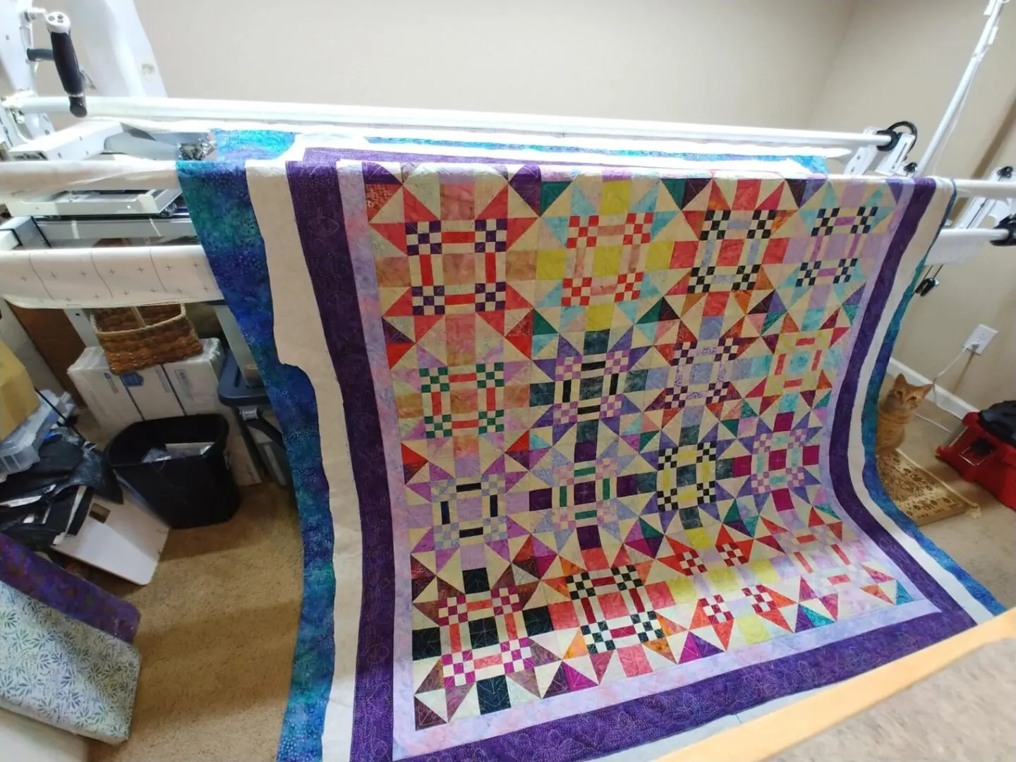 A quilt is being made on the machine.