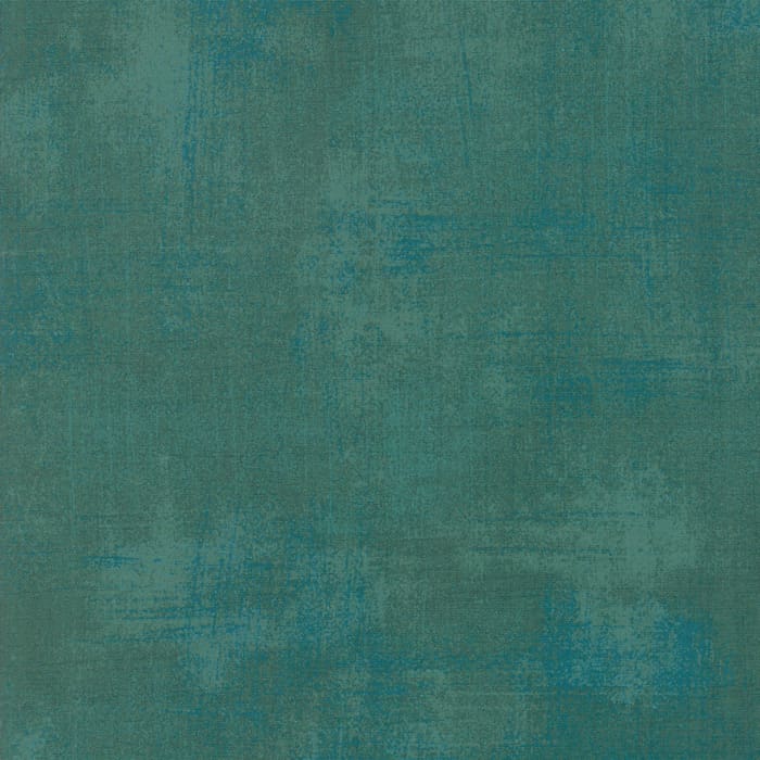 Teal textured background with subtle variations.