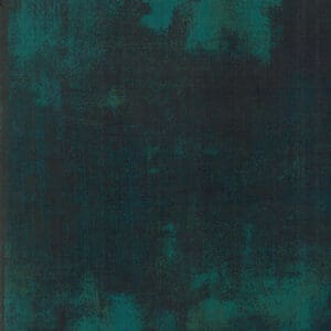 Dark teal textured abstract background.
