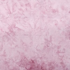Light pink textured fabric with subtle floral patterns.