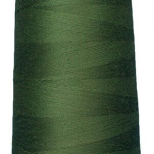 A spool of dark green thread.