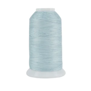 Light blue sewing thread spool on white.