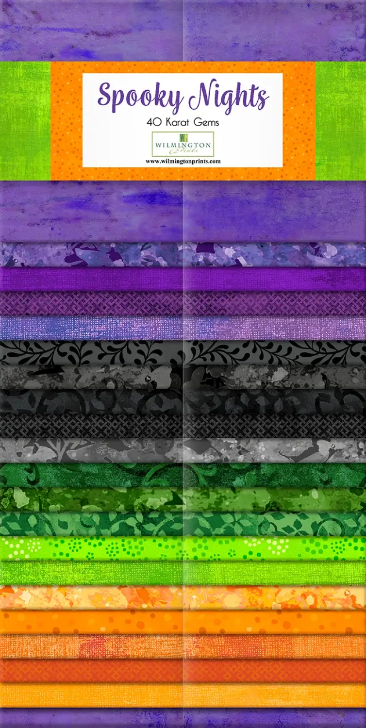 Colorful fabric strips in Halloween-themed hues.