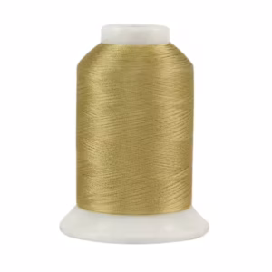 Gold metallic embroidery thread spool