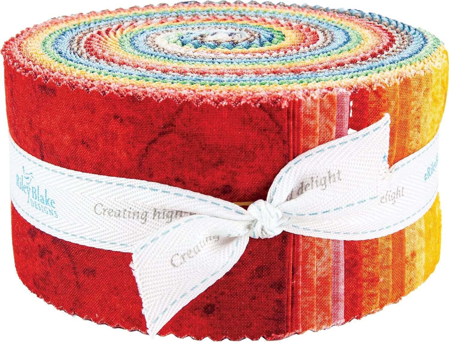 Rolled fabric bundle with colorful patterns.