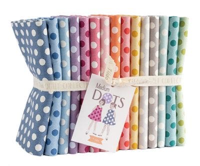 Assorted colorful polka-dot fabric bundle with tag