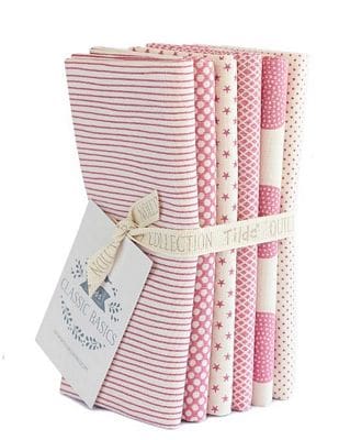 Pink patterned fabric bundle for quilting projects