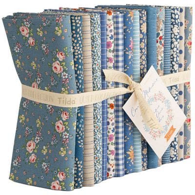 Blue floral fabric bundle tied with ribbon