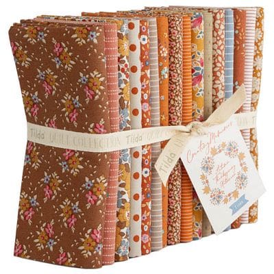 stack of floral autumn fabric fat quarters