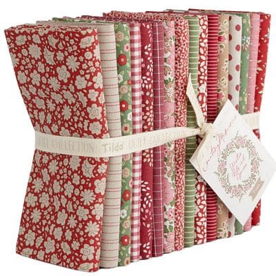Tied bundle of floral quilting fabrics